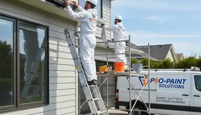 Professional gutter painting on stucco home by house painters in Pasadena, CA